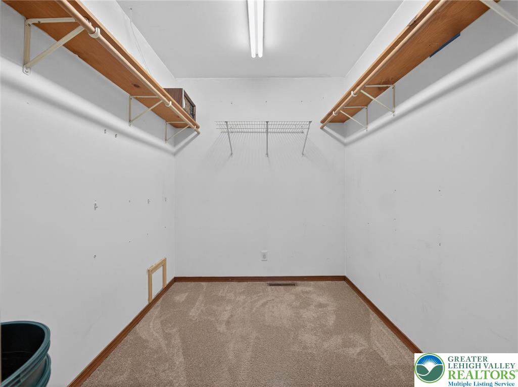 7098 Limerick Square Bath, PA 18014 - Photo 15 of 31 a view of a room with racks on the wall