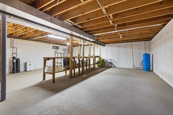a view of a room with wooden walls