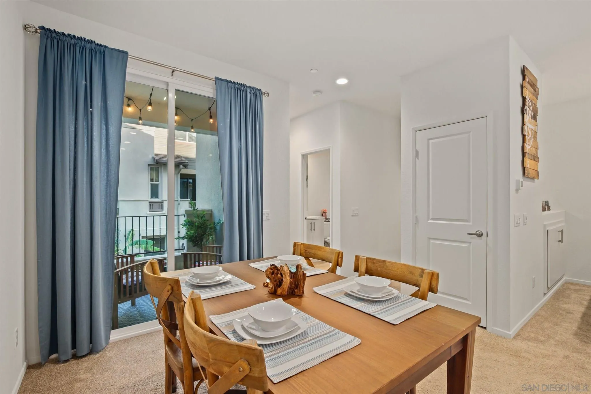 1150 Via Lucero Oceanside, CA 92056 - Photo 16 of 36 a view of a dining room and livingroom with furniture