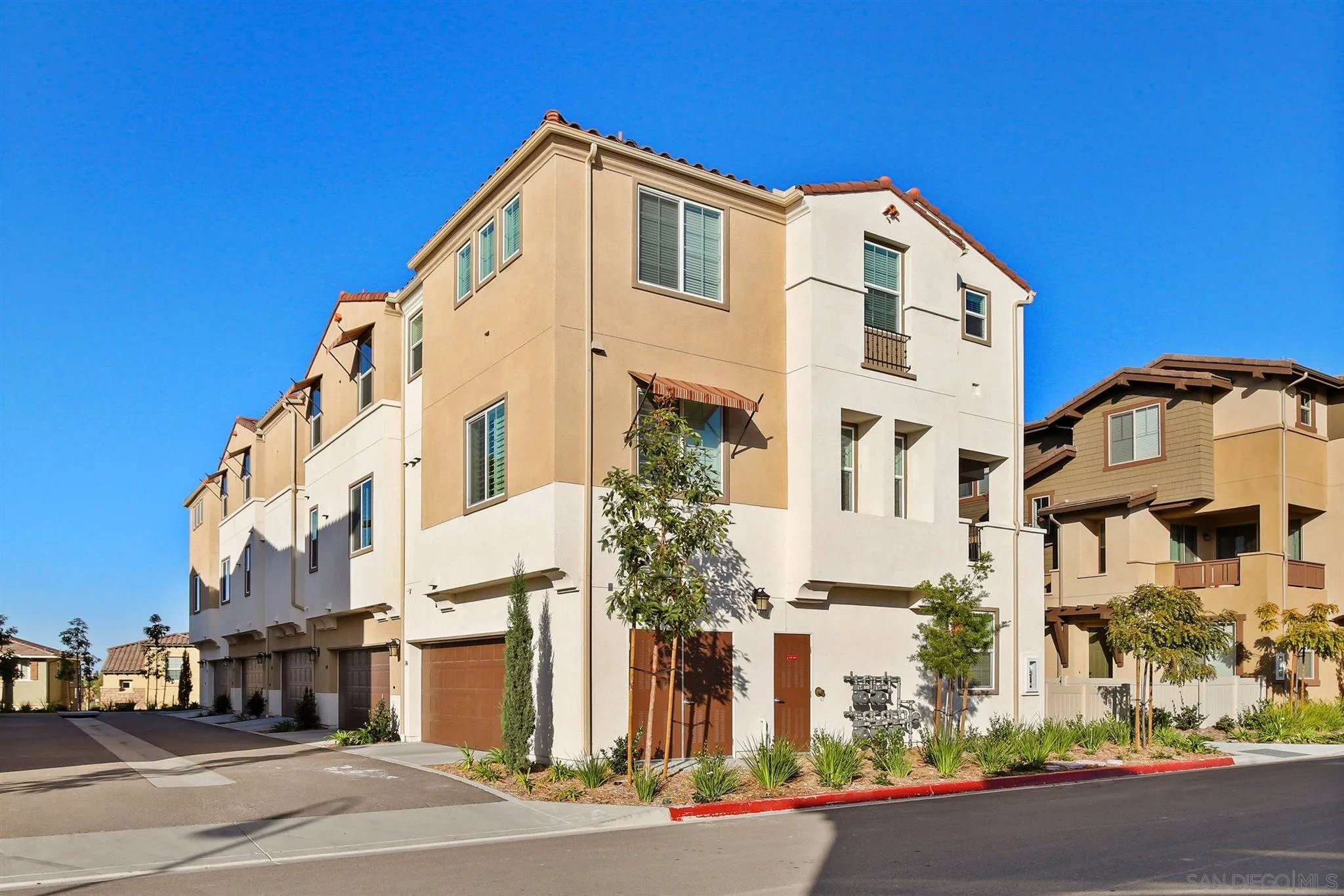 1150 Via Lucero Oceanside, CA 92056 - Photo 3 of 36 a front view of a large building