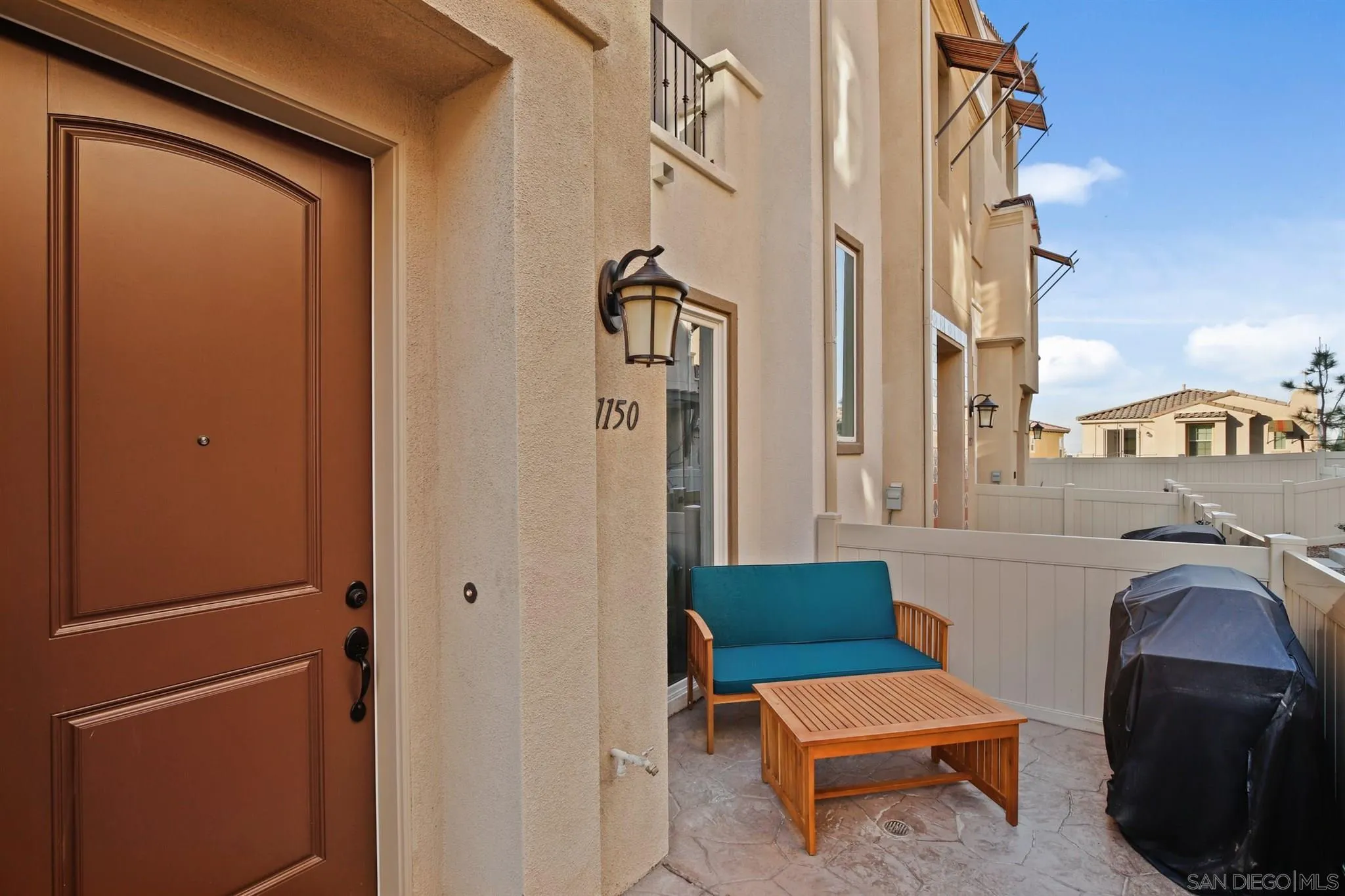 1150 Via Lucero Oceanside, CA 92056 - Photo 31 of 36 a view of living room and front door