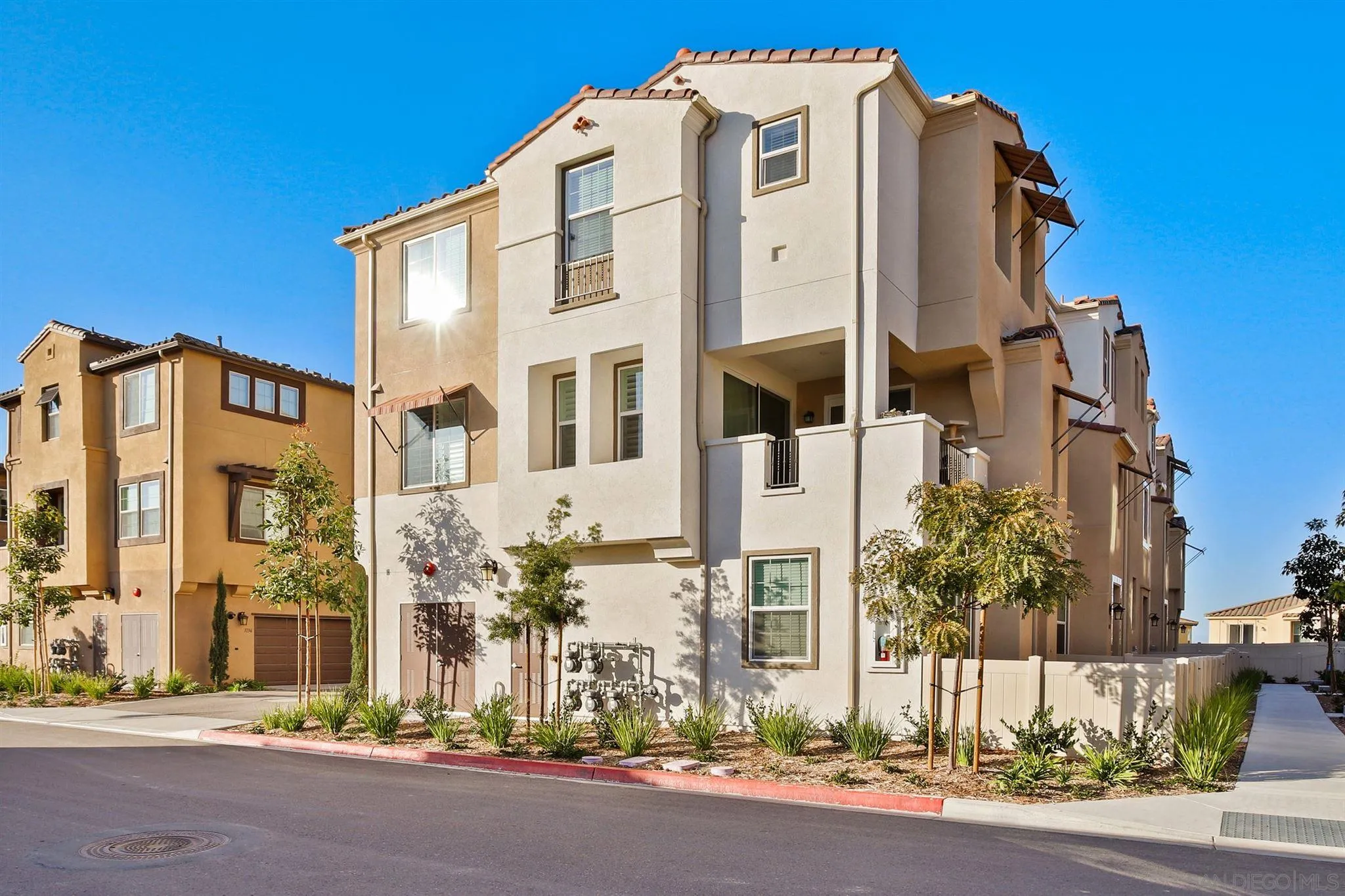 1150 Via Lucero Oceanside, CA 92056 - Photo 4 of 36 a front view of a building with street view