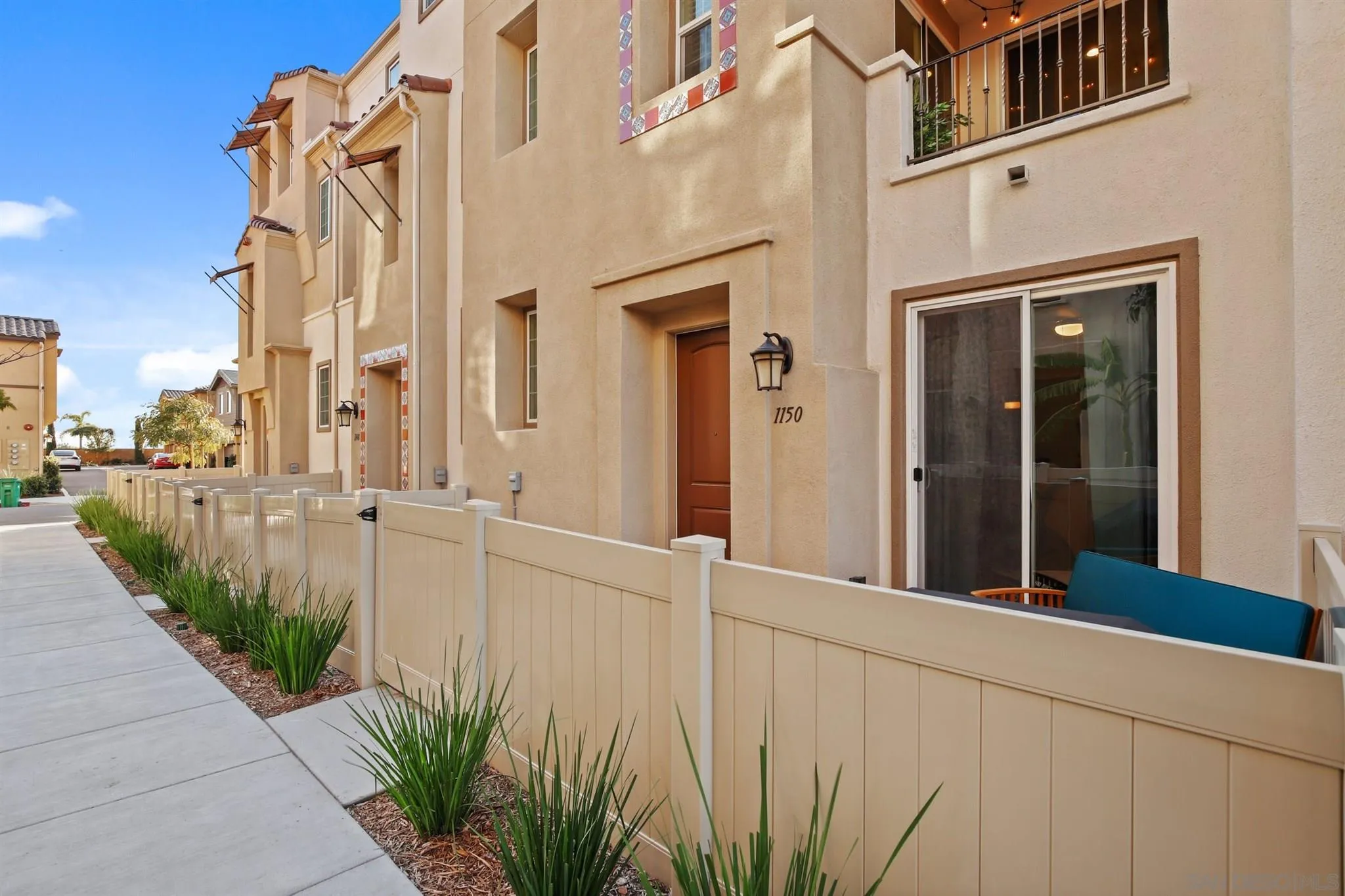 1150 Via Lucero Oceanside, CA 92056 - Photo 5 of 36 a view of a building with a street view