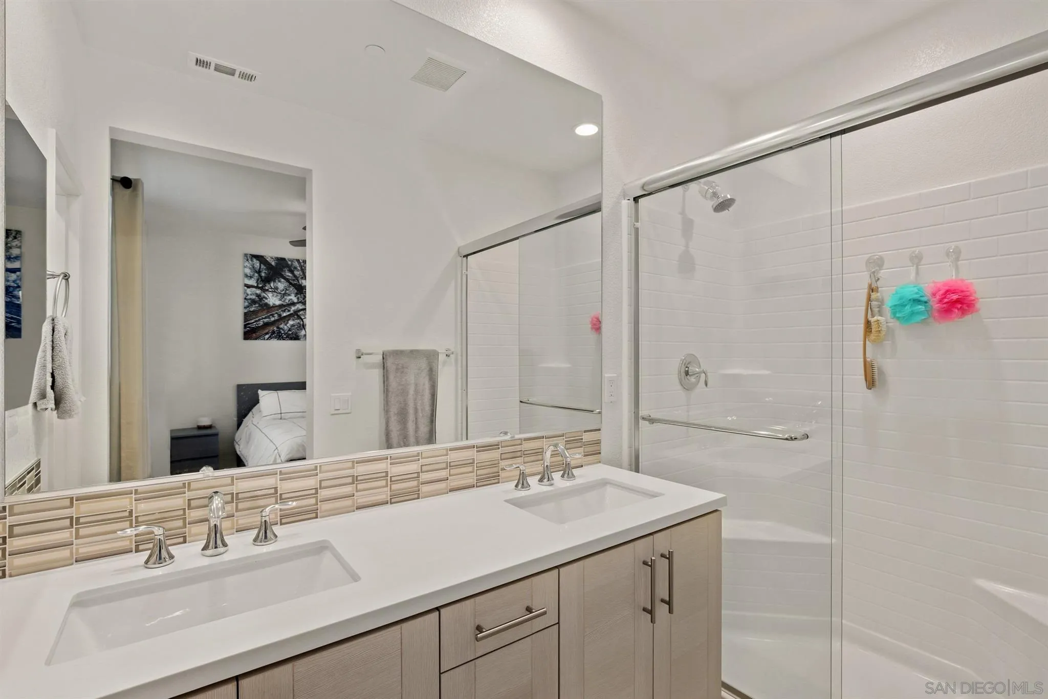 1150 Via Lucero Oceanside, CA 92056 - Photo 10 of 36 a bathroom with a granite countertop sink mirror and double