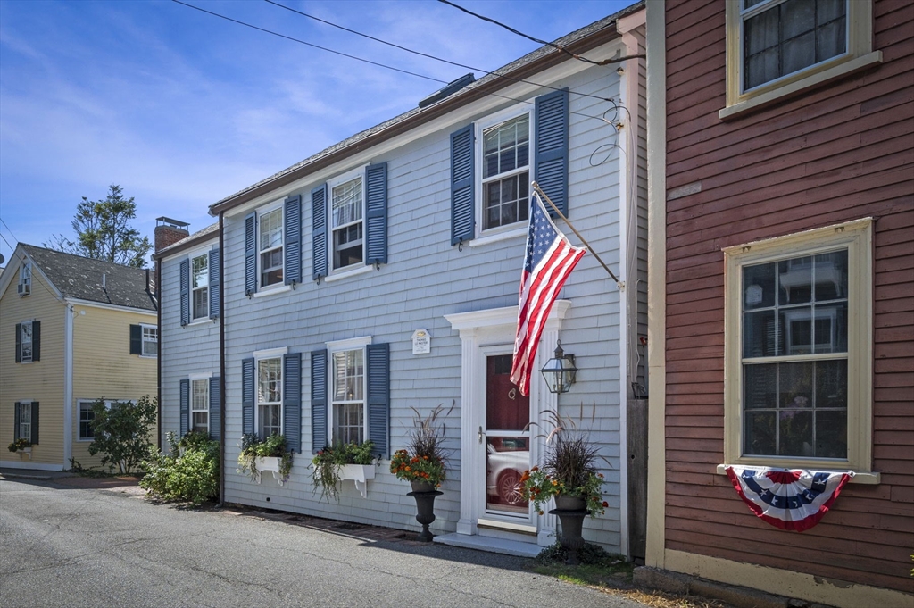 34 Front Street Marblehead, MA 01945 - Photo 2 of 41 a backyard of a house with seating space