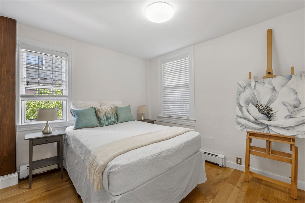 34 Front Street Marblehead, MA 01945 - Photo 23 of 41 a bedroom with a bed and a window