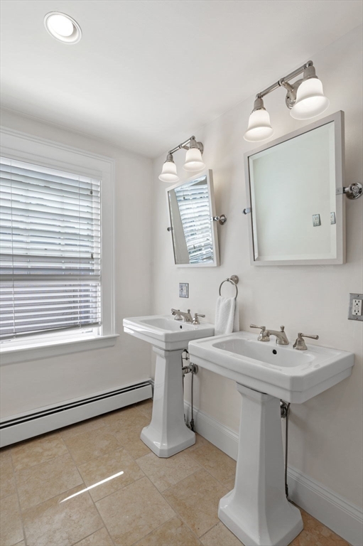 34 Front Street Marblehead, MA 01945 - Photo 33 of 41 a bathroom with a sink and a mirror