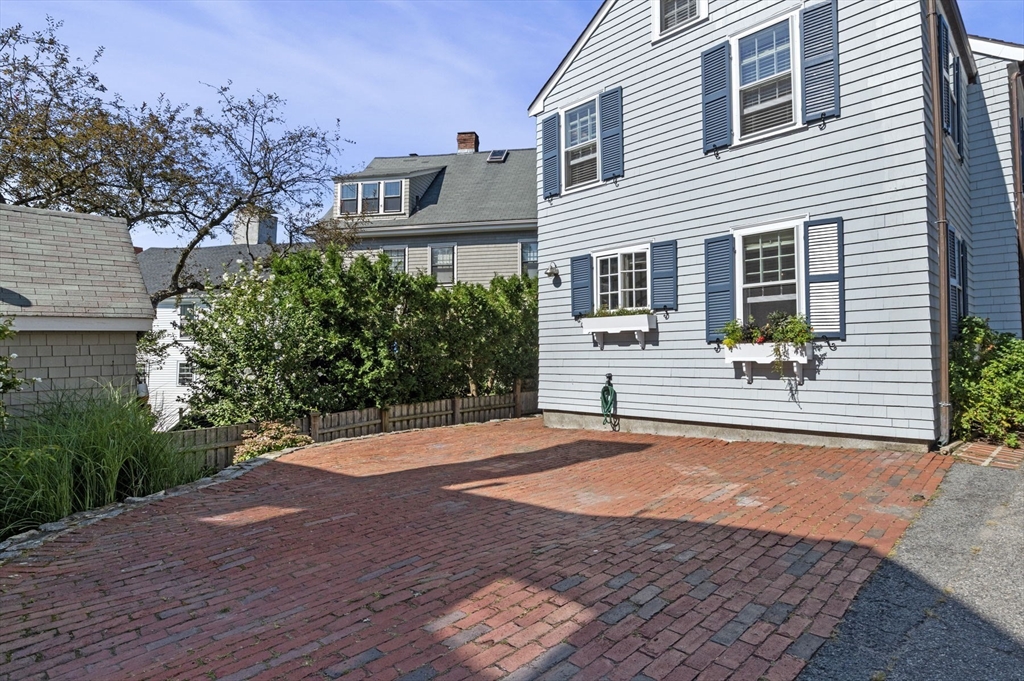 34 Front Street Marblehead, MA 01945 - Photo 38 of 41 a front view of a house with a yard