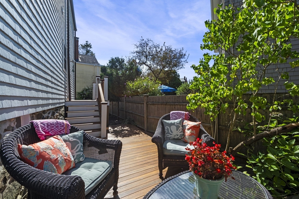 34 Front Street Marblehead, MA 01945 - Photo 39 of 41 a view of outdoor sitting area with furniture and wooden fence