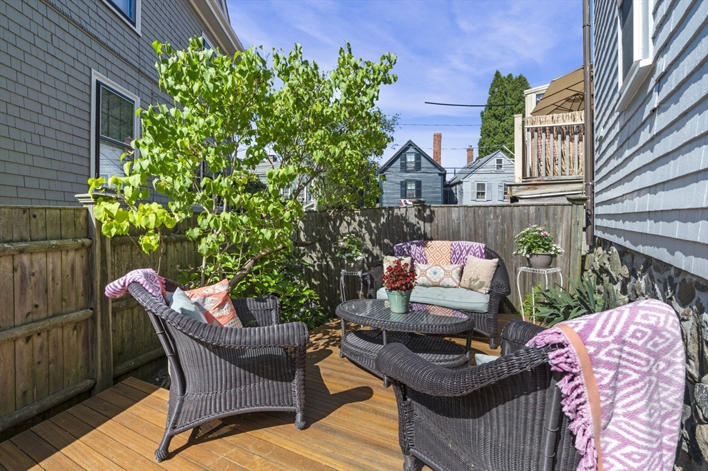 34 Front Street Marblehead, MA 01945 - Photo 40 of 41 a backyard of a house with seating space