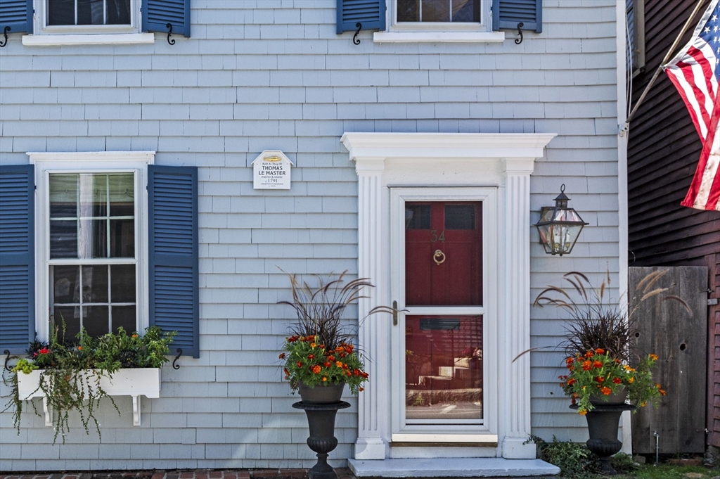 34 Front Street Marblehead, MA 01945 - Photo 4 of 41 a front view of a house with a porch