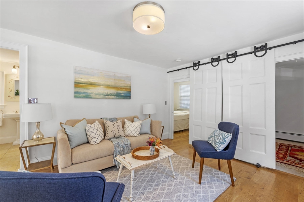 34 Front Street Marblehead, MA 01945 - Photo 9 of 41 a living room with furniture and a rug
