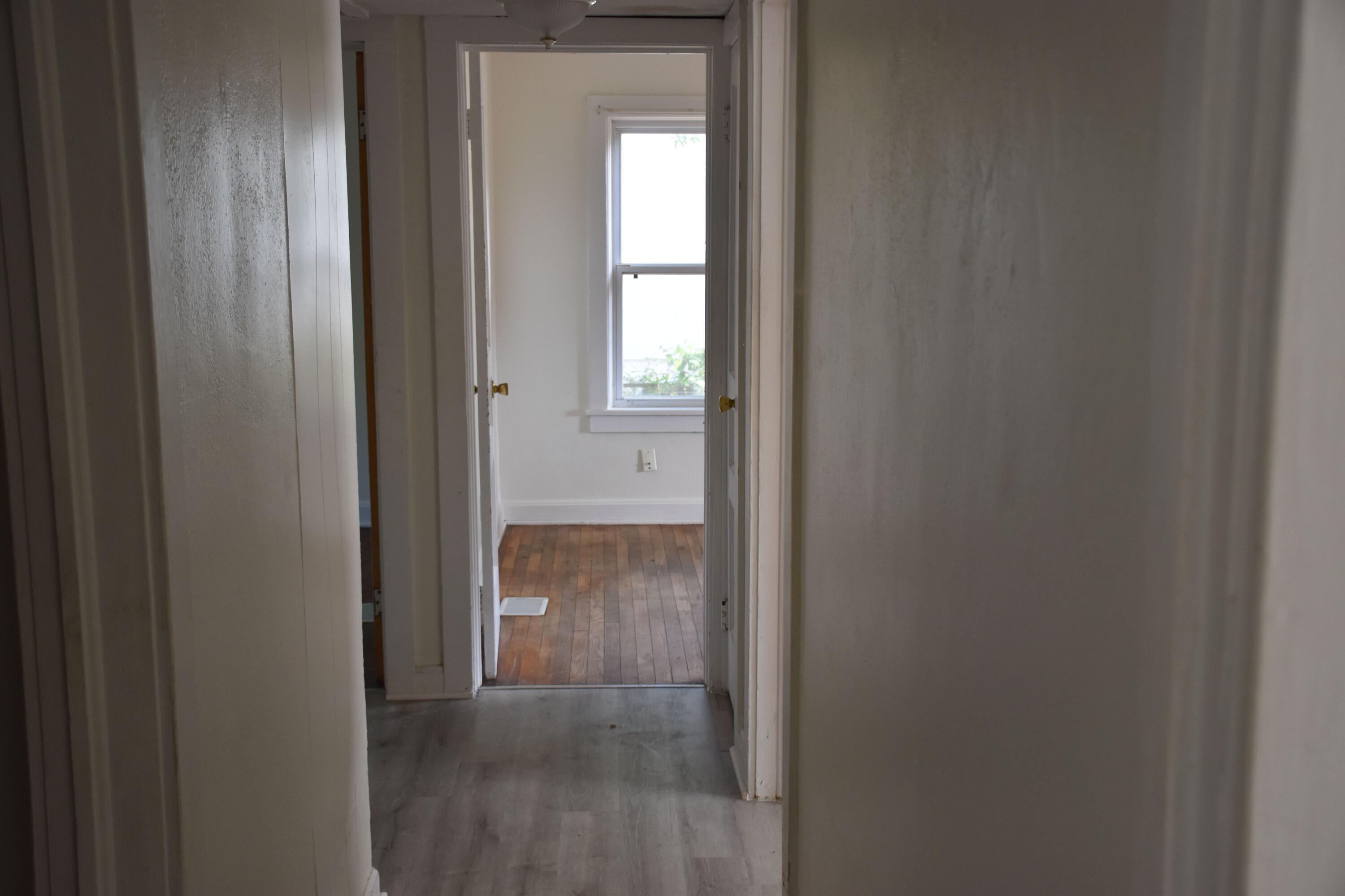 326 Dixie Street Crestview, FL 32536 - Photo 9 of 10 a view of a bathroom from a hallway