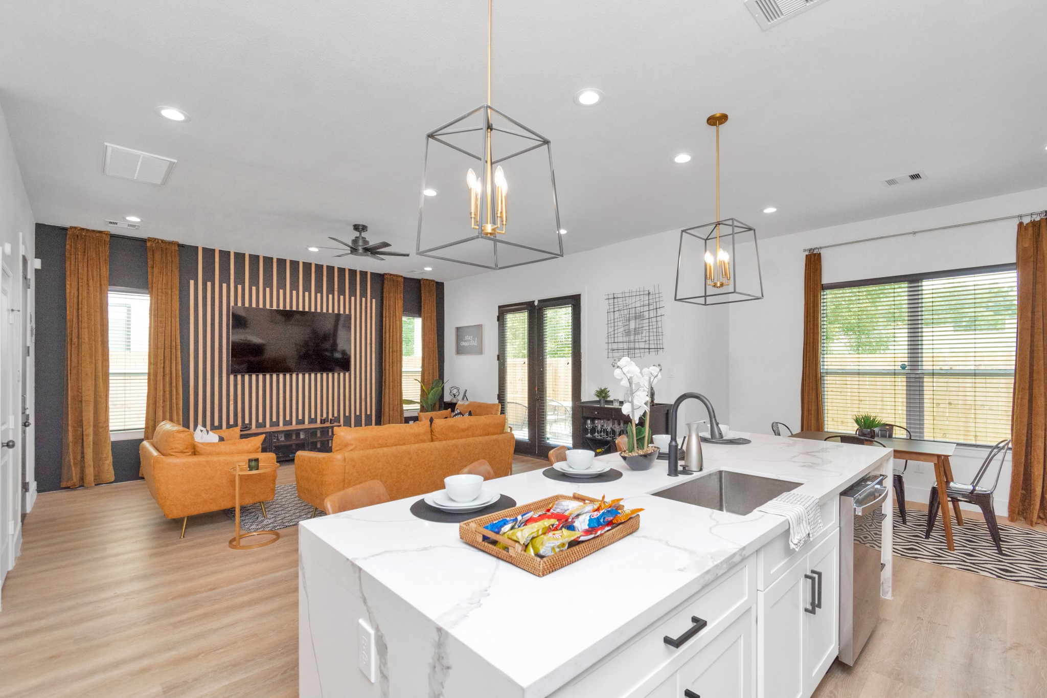 5308 Denmark Street Houston, TX 77028 - Photo 11 of 36 a large kitchen with kitchen island a large island in it