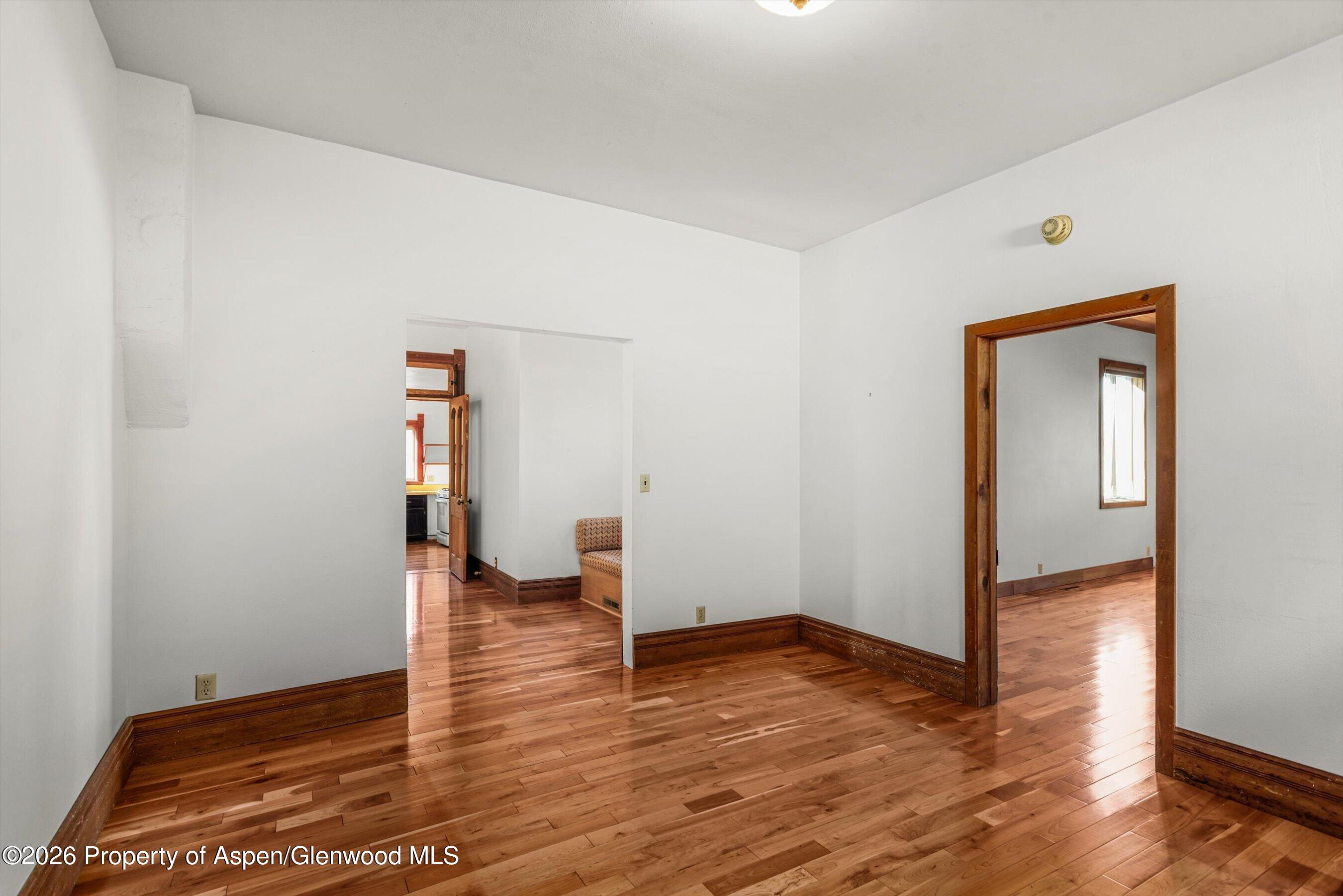235 East Homestead Drive Basalt, CO 81621 - Photo 11 of 38 a view of empty room with wooden floor