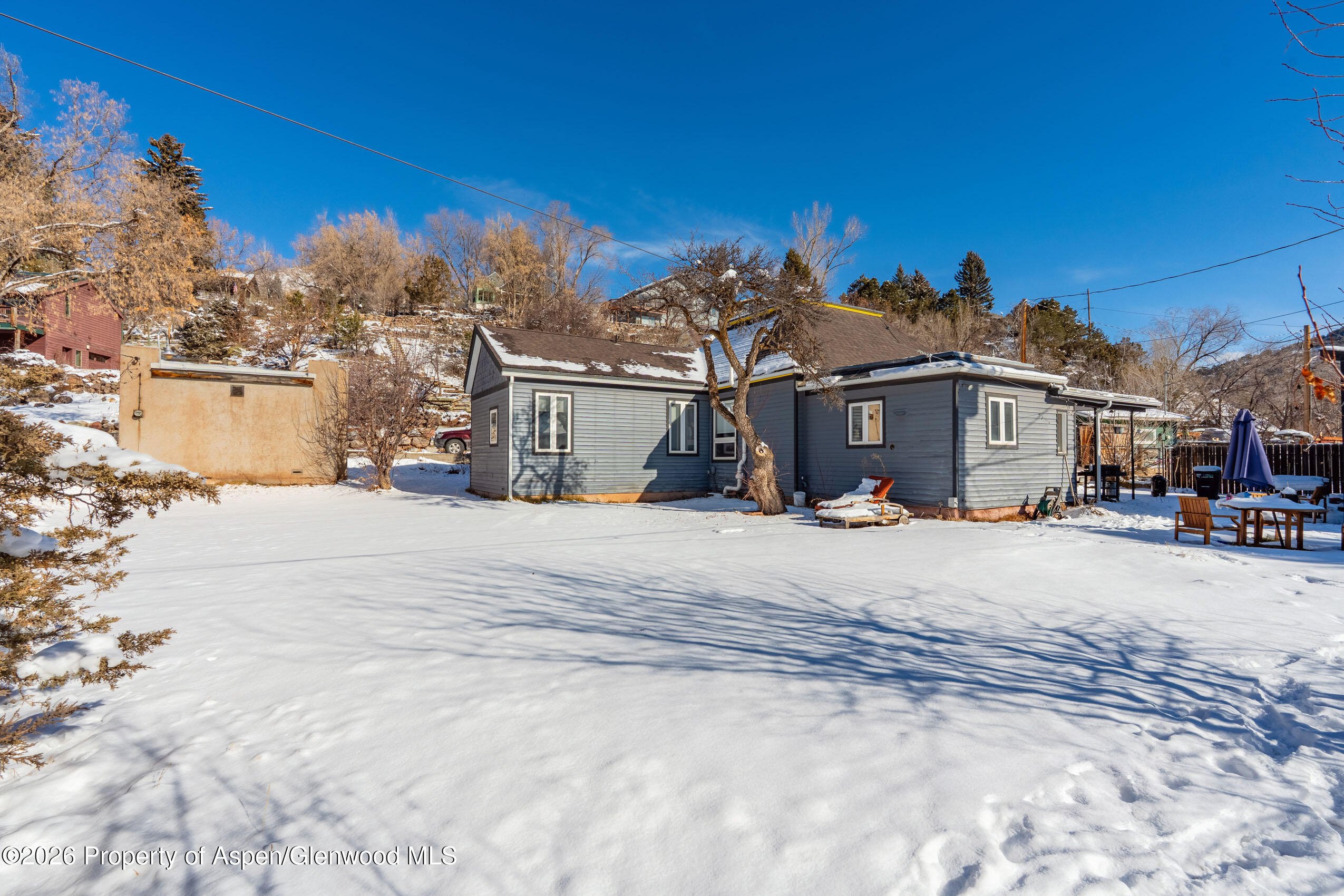 235 East Homestead Drive Basalt, CO 81621 - Photo 22 of 38 a view of a house with a snow in the background