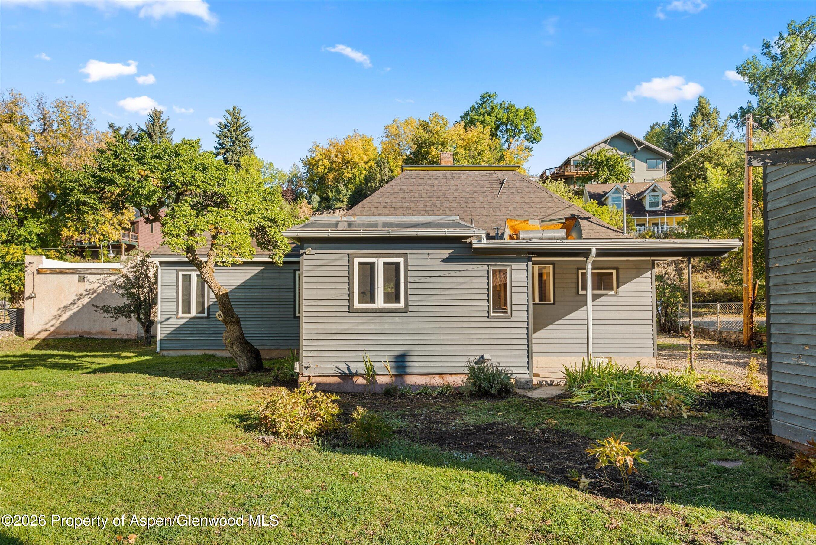 235 East Homestead Drive Basalt, CO 81621 - Photo 27 of 38 a front view of a house with a yard