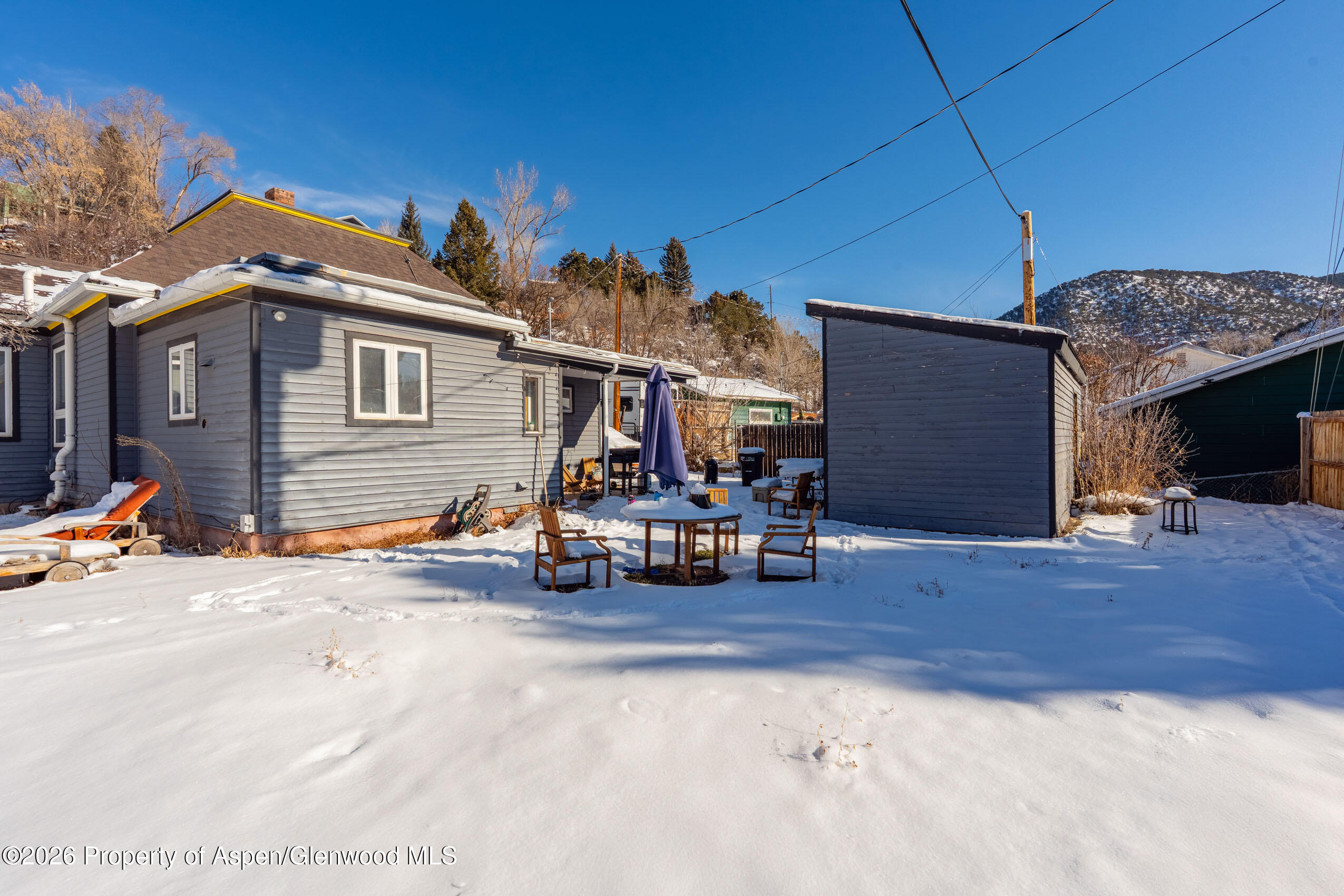 235 East Homestead Drive Basalt, CO 81621 - Photo 30 of 38 a view of a house with a patio