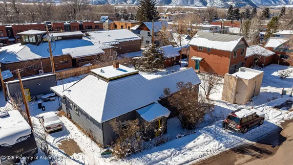 an aerial view of a house with sitting space