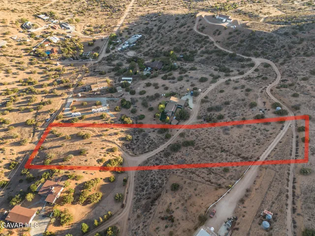 a aerial view of house with yard