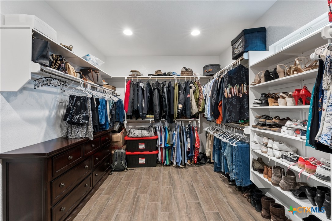 979 Inka Road Salado, TX 76571 - Photo 26 of 47 Primary Walk-in Closet leading to Laundry Room
