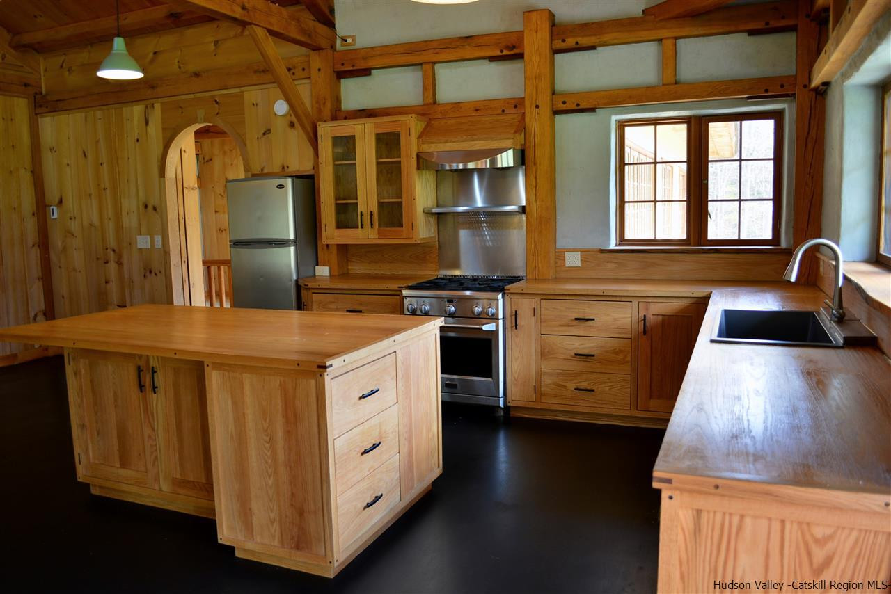 328 Stony Kill Road Accord, NY 12404 - Photo 14 of 35 a kitchen that has a stove a sink and a refrigerator