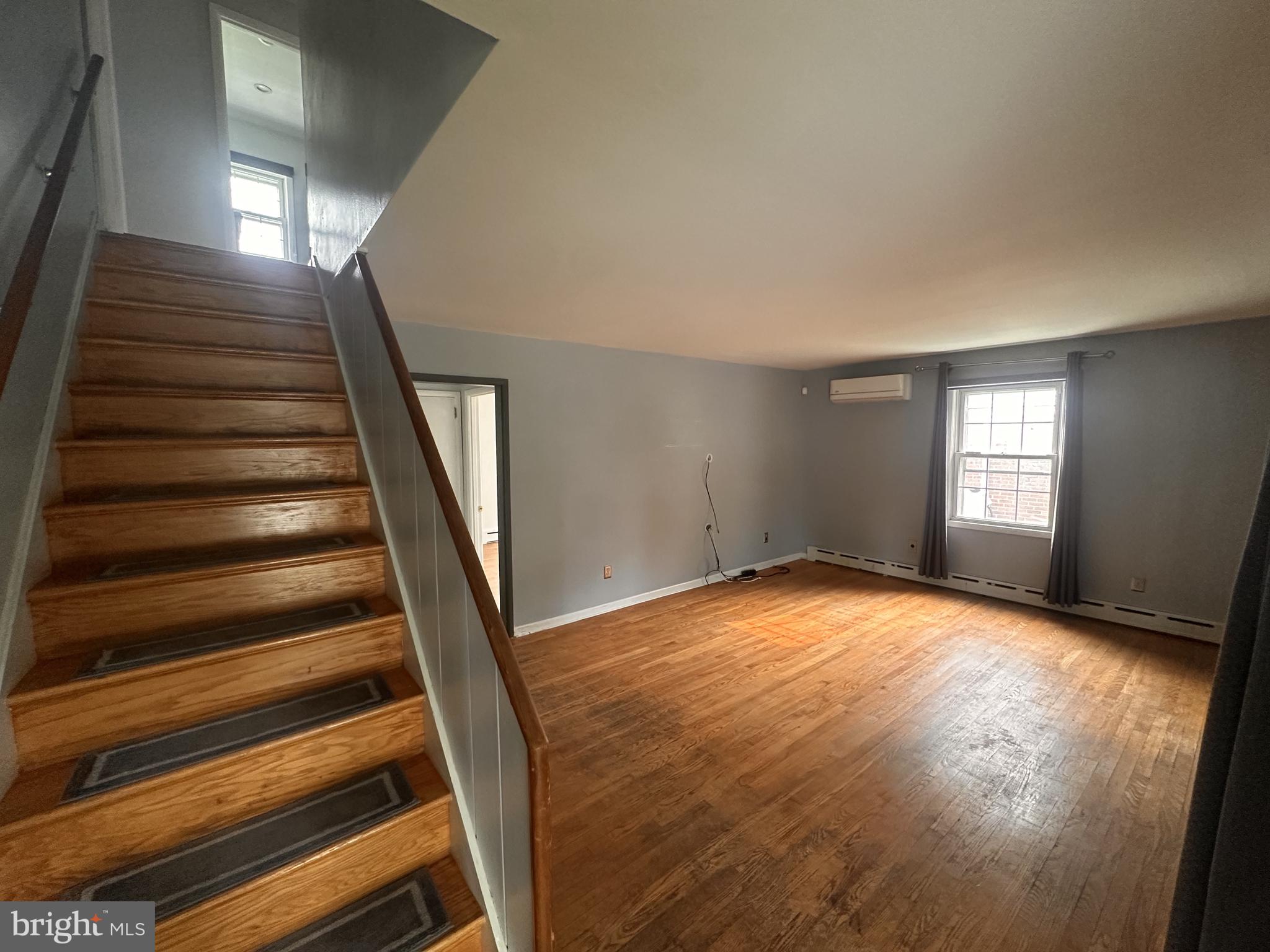 115 Murphy Road Wilmington, DE 19803 - Photo 3 of 17 a view of wooden floor and windows in a room