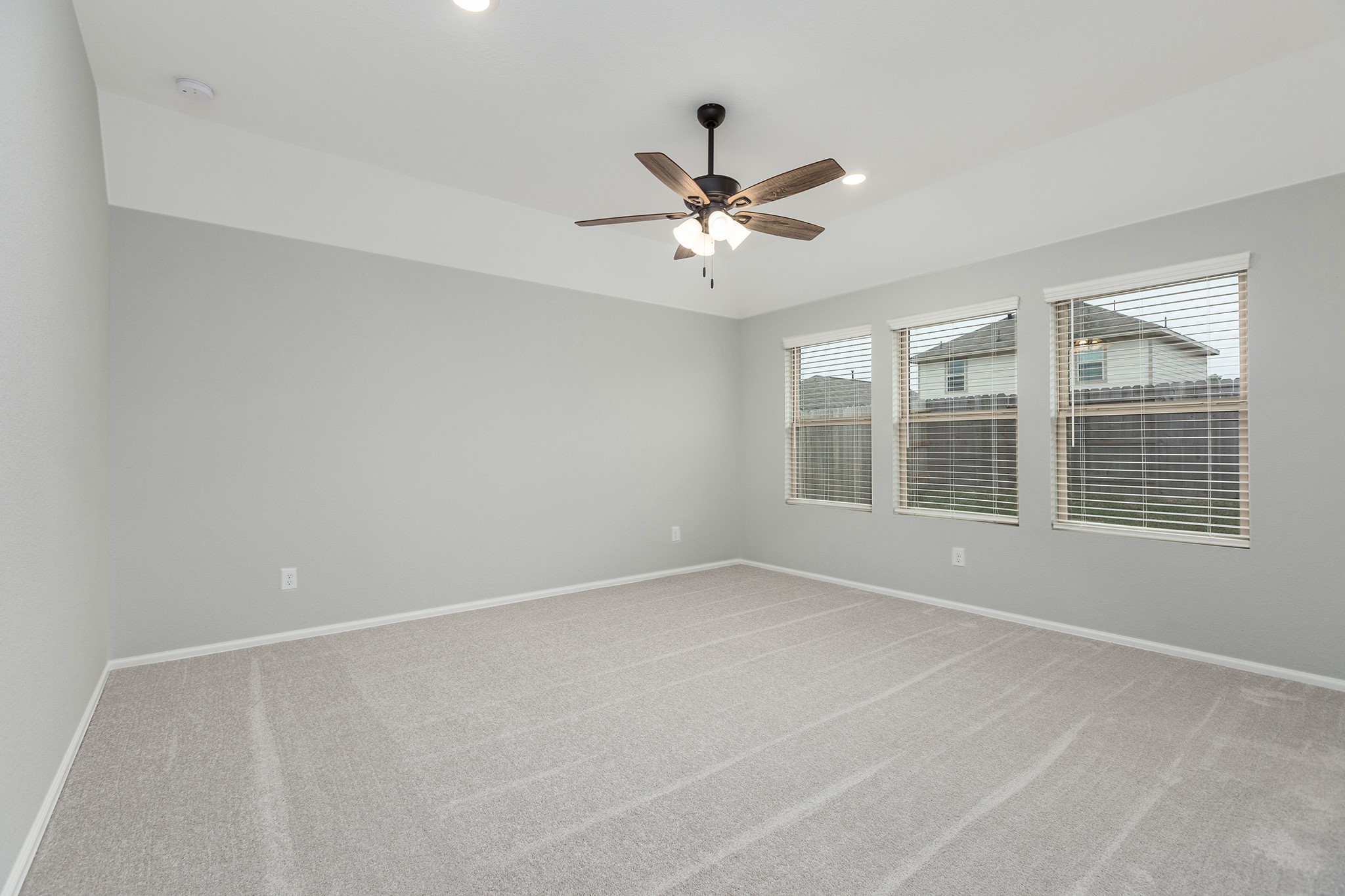 6327 Arcadia Sound Lane Houston, TX 77365 - Photo 14 of 33 a view of an empty room with a window