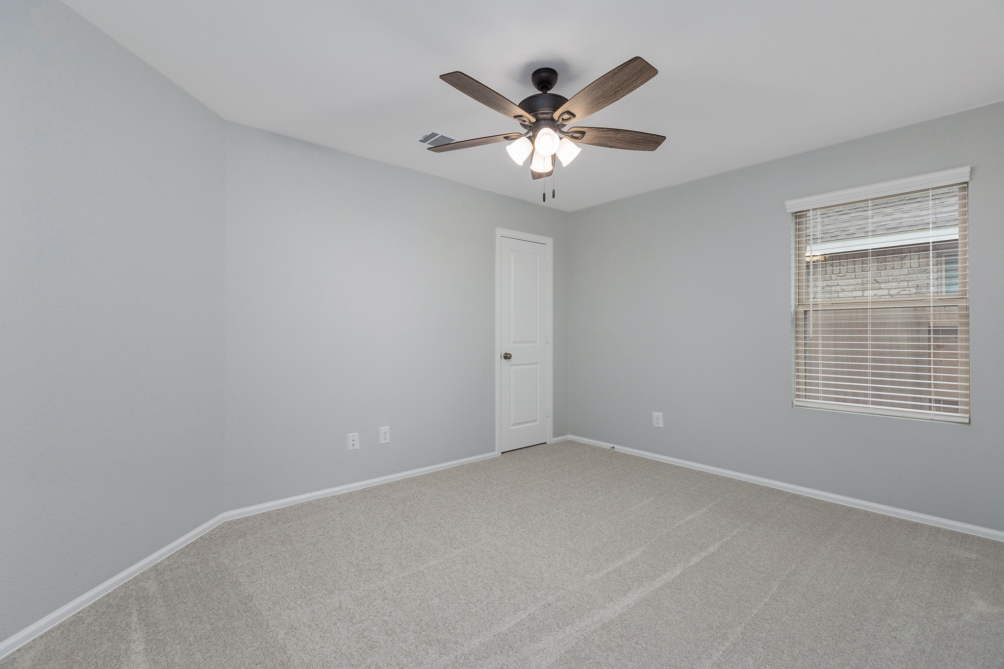 6327 Arcadia Sound Lane Houston, TX 77365 - Photo 19 of 33 a view of an empty room with a window
