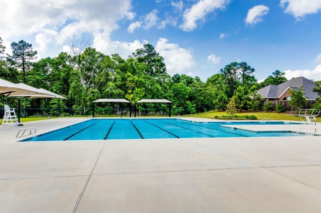 6327 Arcadia Sound Lane Houston, TX 77365 - Photo 29 of 33 a view of outdoor space yard and swimming pool
