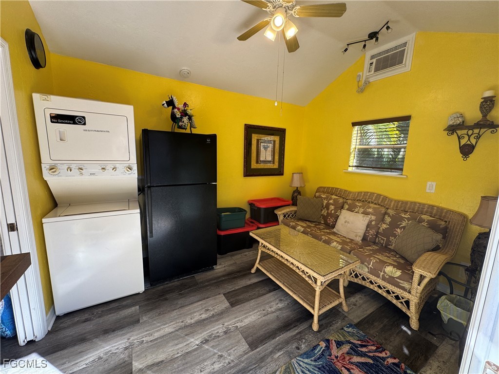 Lot 212-3027 Belle Of Myers Road LaBelle, FL 33935 - Photo 25 of 43 a living room with a couch and a table