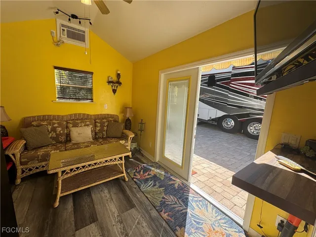 a wooden bench sitting in front of a building