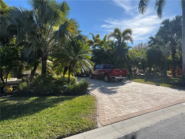 a view of backyard of a house