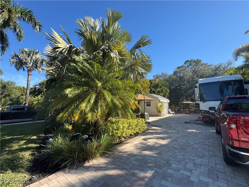 Lot 212-3027 Belle Of Myers Road LaBelle, FL 33935 - Photo 7 of 43 a view of a house with a patio
