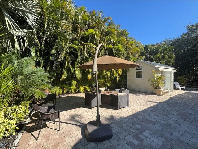 a garden view with a seating space