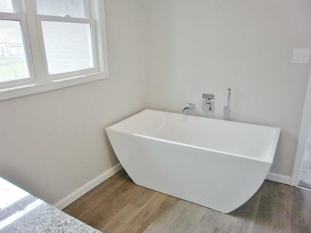 305 East McMurray Road Canonsburg, PA 15317 - Photo 13 of 24 a white bath tub sitting in a bathroom
