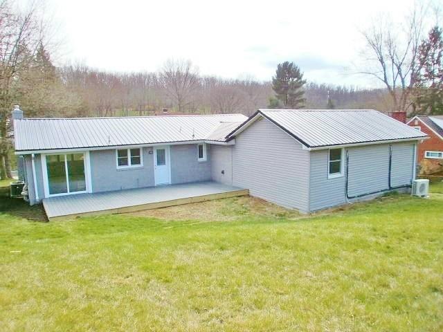 305 East McMurray Road Canonsburg, PA 15317 - Photo 23 of 24 a view of a house with pool and a garden