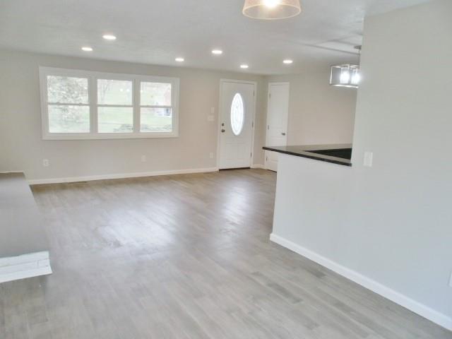 305 East McMurray Road Canonsburg, PA 15317 - Photo 3 of 24 an empty room with wooden floor and windows