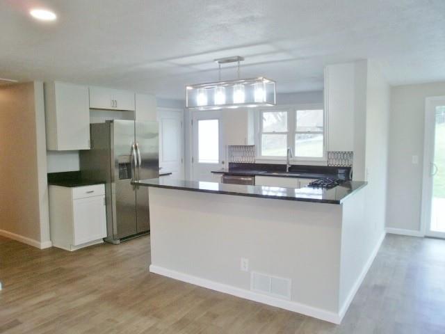 305 East McMurray Road Canonsburg, PA 15317 - Photo 5 of 24 a kitchen with stainless steel appliances granite countertop a sink and a refrigerator