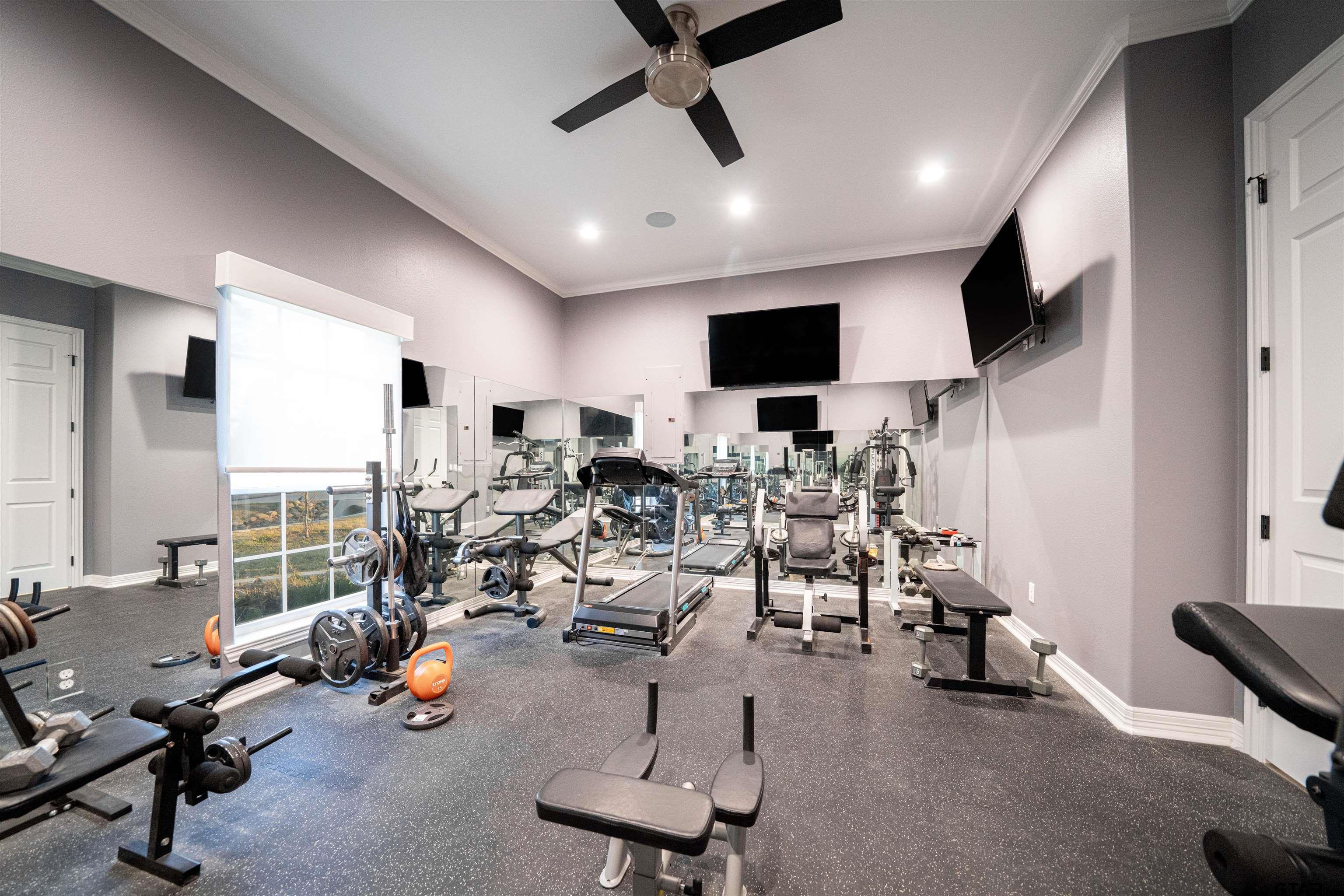 145 Private Road Pittsburg, TX 75686 - Photo 21 of 46 a view of a room with gym equipment