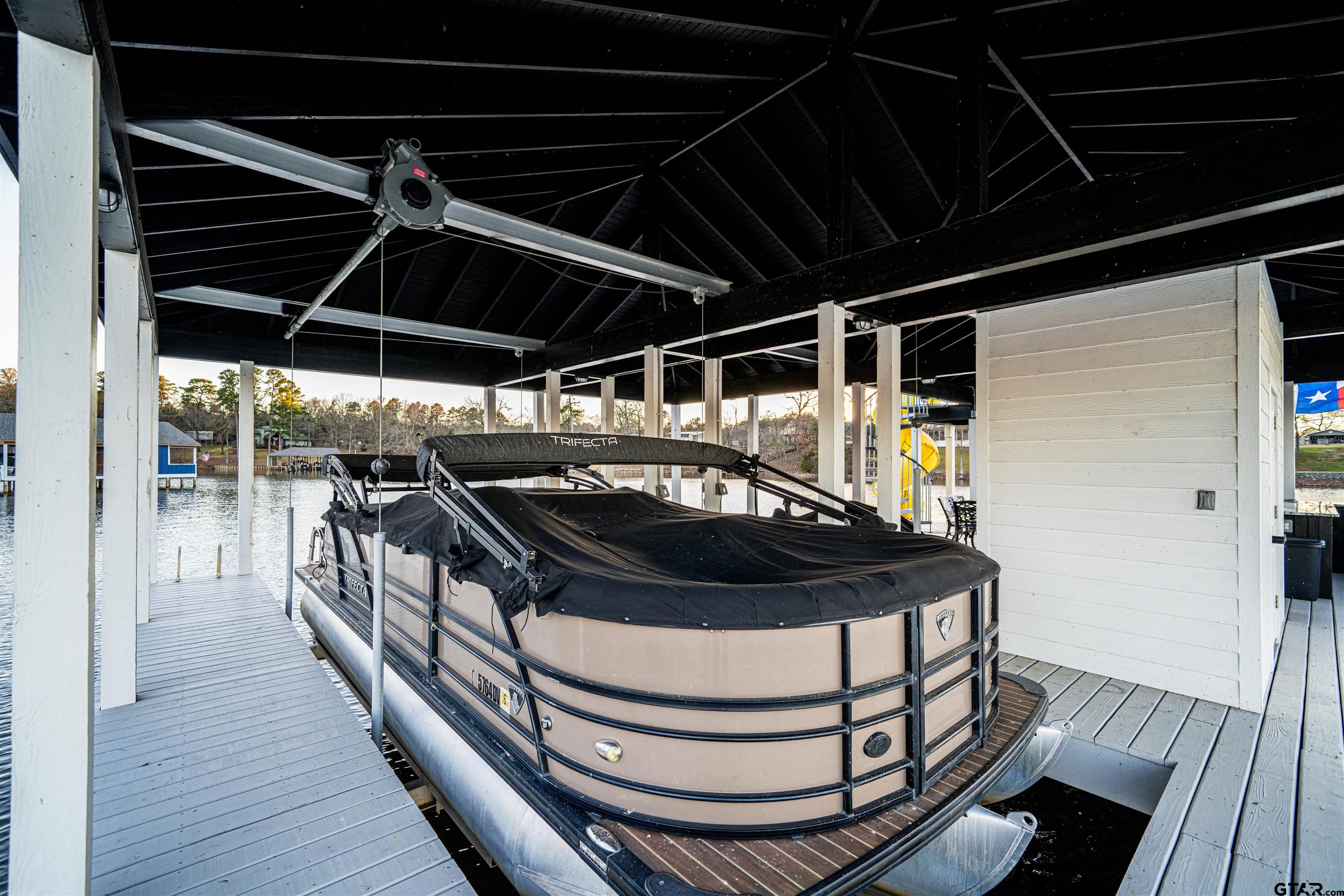 145 Private Road Pittsburg, TX 75686 - Photo 37 of 46 a car parked in front of a house