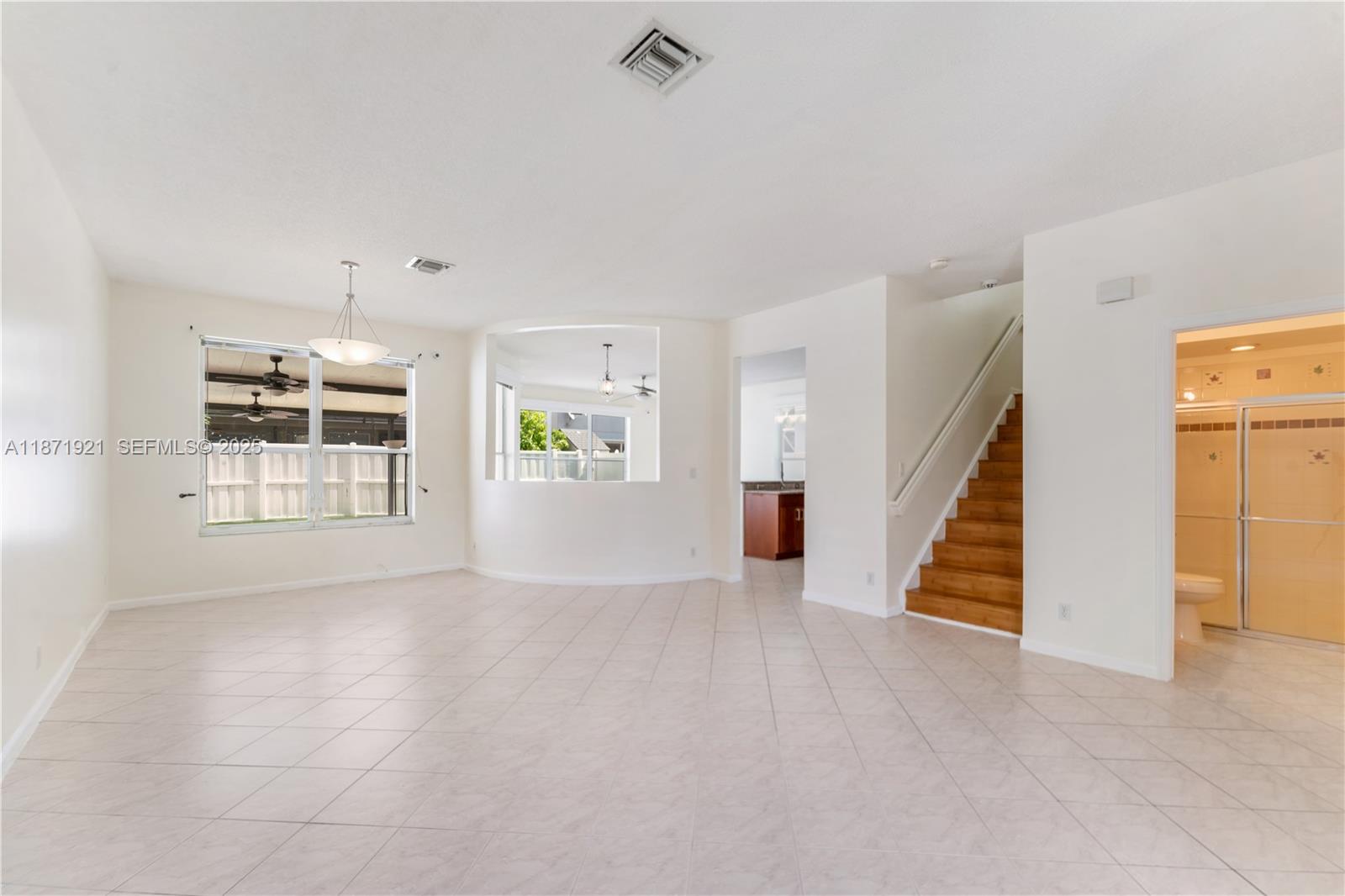 1943 Southwest 149th Avenue Miramar, FL 33027 - Photo 15 of 26 a view of an empty room with a window