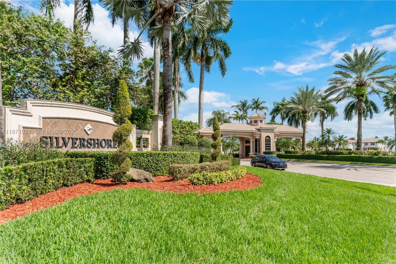 1943 Southwest 149th Avenue Miramar, FL 33027 - Photo 22 of 26 a view of a house with swimming pool and a yard