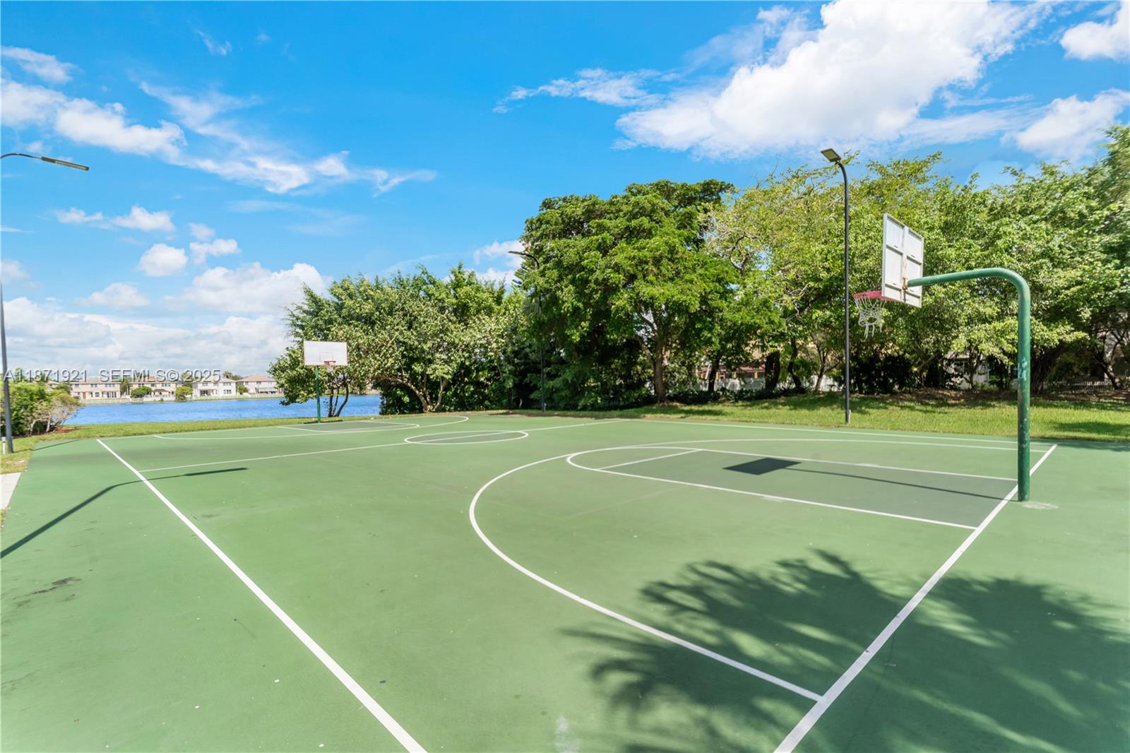 1943 Southwest 149th Avenue Miramar, FL 33027 - Photo 24 of 26 a view of a tennis court