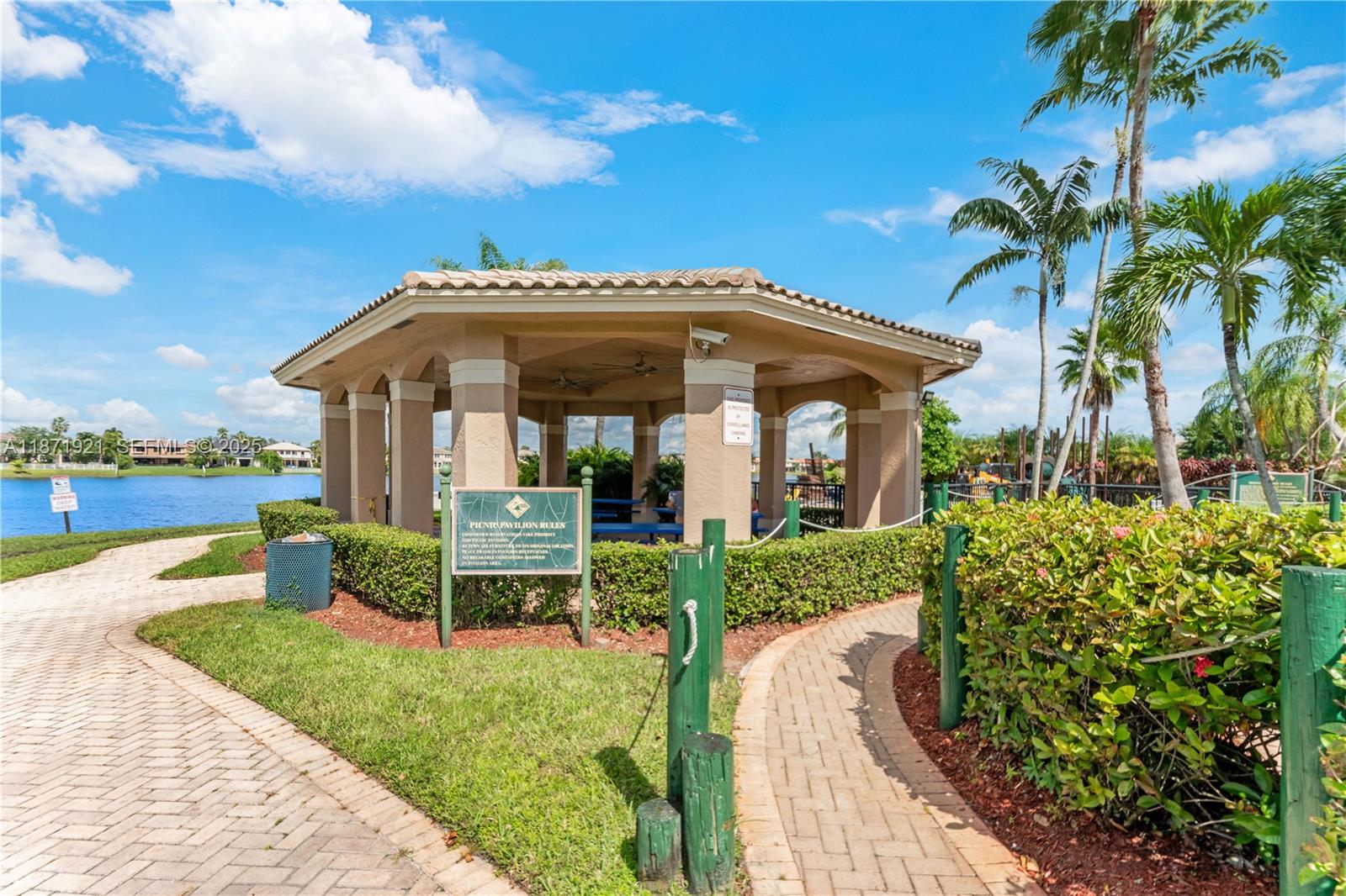 1943 Southwest 149th Avenue Miramar, FL 33027 - Photo 25 of 26 a front view of a house with garden