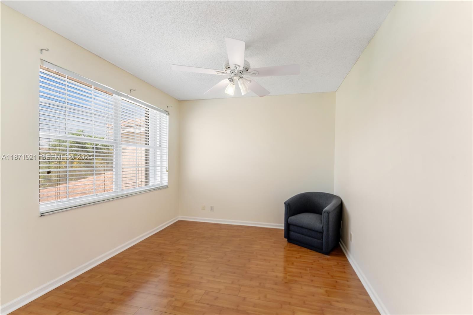 1943 Southwest 149th Avenue Miramar, FL 33027 - Photo 10 of 26 an empty room with a window
