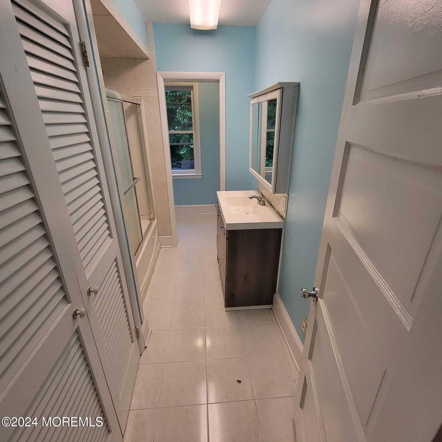 63 Reids Hill Road Morganville, NJ 07751 - Photo 22 of 32 a view of an entryway with furniture