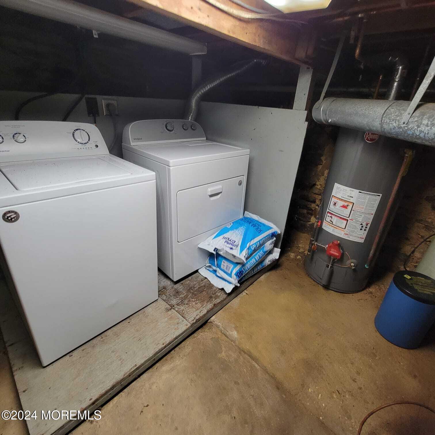 63 Reids Hill Road Morganville, NJ 07751 - Photo 29 of 32 a utility room with dryer and washer