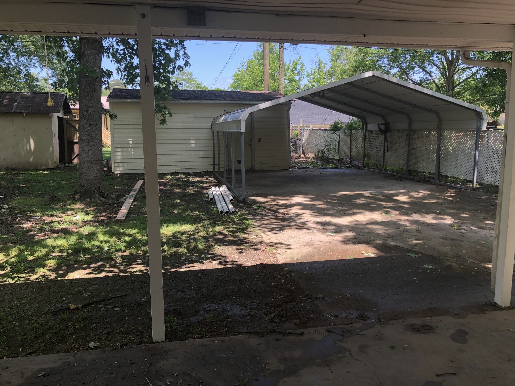 421 Oakwood Road Tullahoma, TN 37388 - Photo 3 of 13 a backyard of a house with lots of green space
