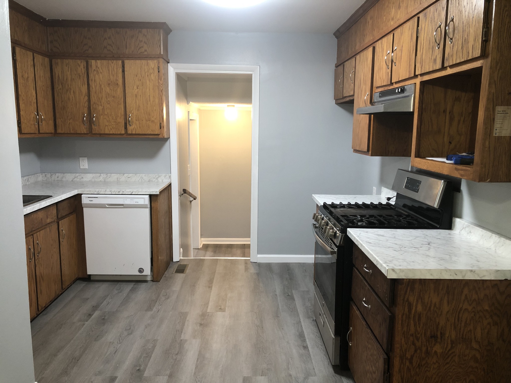 421 Oakwood Road Tullahoma, TN 37388 - Photo 7 of 13 a kitchen with a stove and a refrigerator